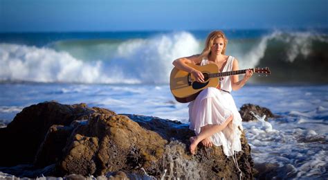 Download Woman Beach Playing Guitar Wallpaper Wallpapers Com