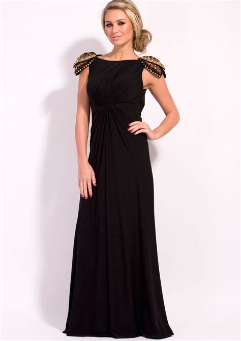 Evidently a halter top emphasizes broad shoulders. broad shoulders | Dresses, Formal dresses, Forever unique