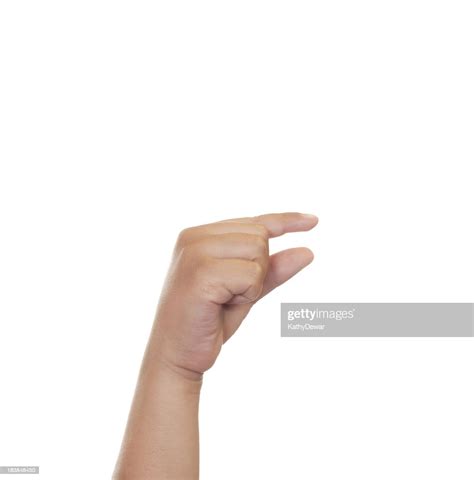 Child Using American Sign Language Letter G High Res Stock Photo