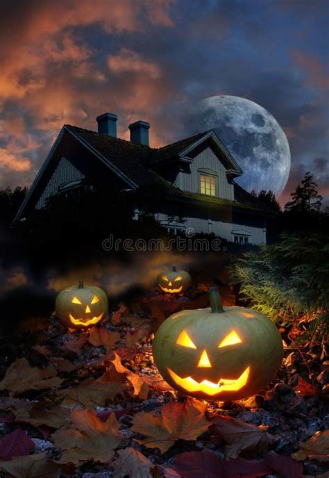 Smiling Carved Jack O Lantern Halloween Pumpkin Burning Haunted House