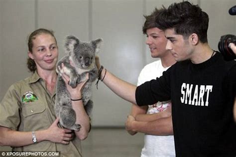 Harry Styles Tweets Photo Of Himself Having A Cuddle With A Koala Bear