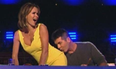 Simon Cowell Kisses Amanda Holdens Bottom As Britains Got Talent Gets Cheeky Daily Mail Online