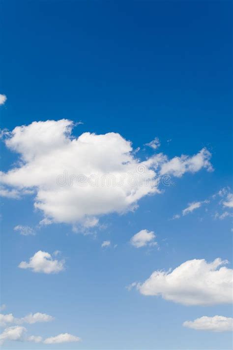 Blue Sky With White Clouds Blue Sky With White Fluffy Clouds Portrait