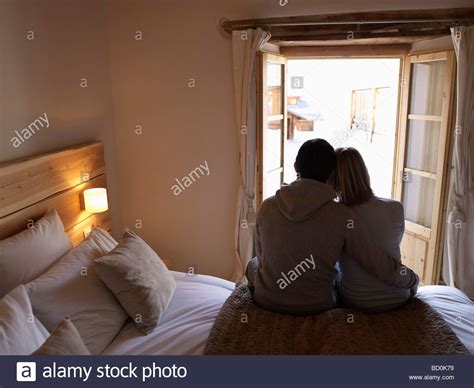 Couple Bed Sitting Man Woman Together Stock Photos And Couple Bed Sitting
