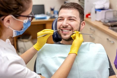 Dentist During Orthodontic Treatment Vinson Orthodontics