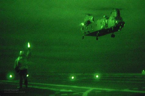 Royal Air Force Chinook Helicopter Lifts Off From Hms Illustrious At