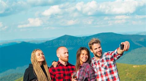 Group Of Hikers Takes Photo In Nature Group Of Friends Taking A Selfie