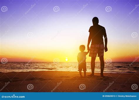 Father And Son At Sunset Beach Stock Image Image Of Outside Adult 89869813