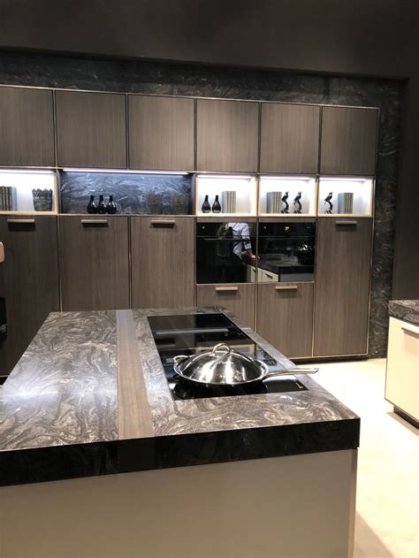You can select a kitchen island with complete cooktop utensils or simple cooktop ones. The Pros And Cons Of Having A Kitchen Island With Built-in ...