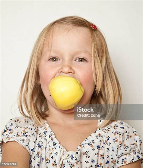 Love For Apples Girl Biting Into The Apple Stock Photo Download Image