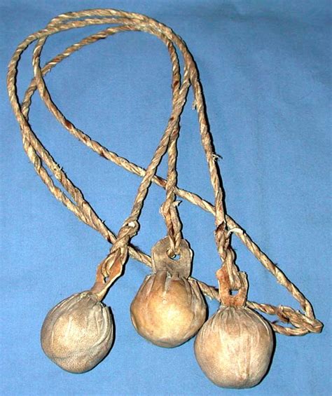 Bola From Argentina With Twisted Leather Cords And Stone Balls