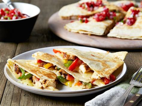 These easy, cheesy chicken quesadillas are a crowd favorite. Chicken Quesadillas Recipe | Ree Drummond | Food Network
