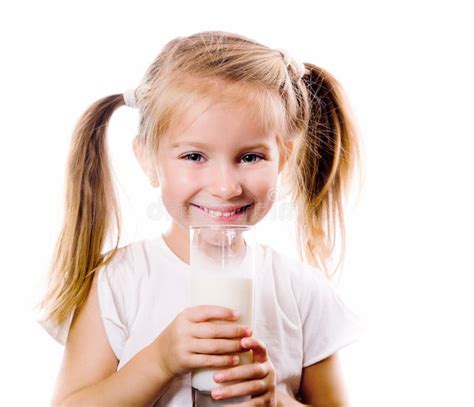 Portrait Of A Little Girl Holding A Cup Of Milk Stock Photo Image Of
