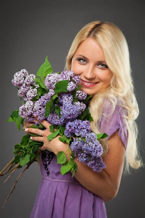 Blonde Girl In Purple Dress Holding Bouquet Of Lilac Stock Image Image Of Pose Lilac 41907165
