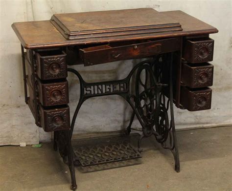 1908 singer treadle sewing machine with carved decorative details olde good things