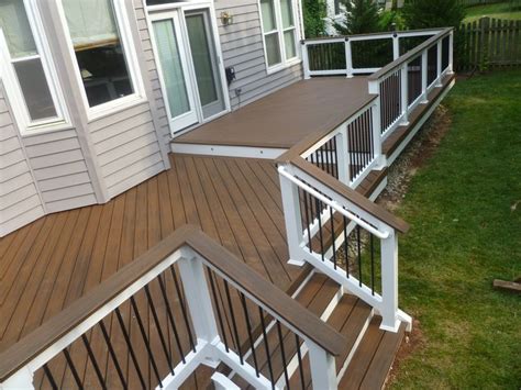 Azek premier railing features infill options where you can choose from square composite balusters or create a modern feel with powder coated aluminum. Nice Trex Deck | Trex deck designs, Decks backyard ...