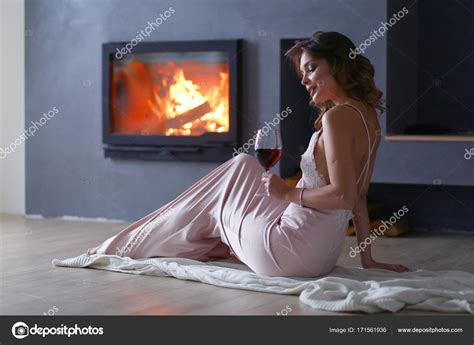 Sexy Woman In Front Of The Fireplace Wood Fireplace Stock Photo By