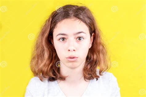 cute curly teenager girl with funny face surprise and shock stock image image of cool