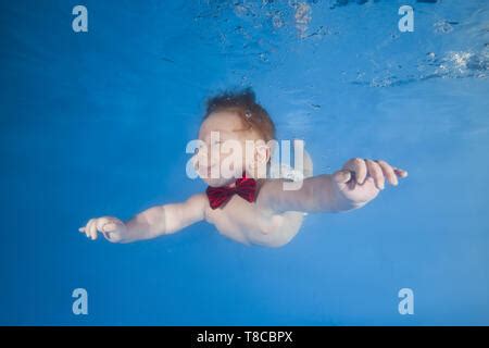 Boy To Swim In The Pool Amusing Shots Show The Exhilarated And Stock