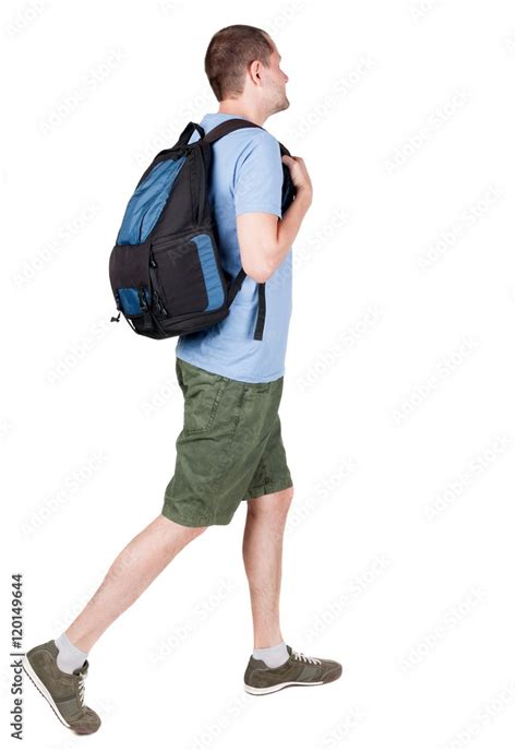 Back View Of Walking Man With Backpack Brunette Guy In Motion