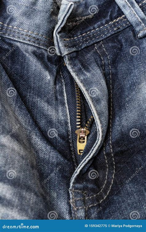 Close Up Zipper Open On Blue Shabby Jeans Denim Texture Zipper Jeans