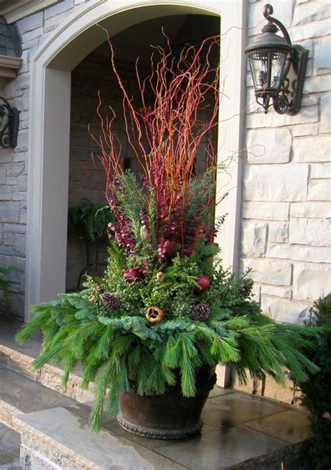 20 Most Amazing Outdoor Winter Planters For Christmas Season Homemydesign
