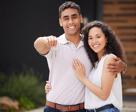 Premium Photo Happy Couple With Key To New Home Together Buying Property As Married Man And
