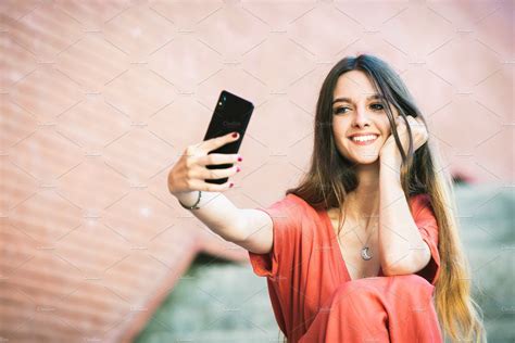 Stylish Woman Captures The Moment With A Selfie
