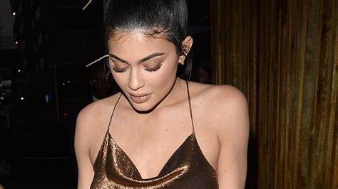 Kylie Jenner Goes Braless In Daring Bronze Slit Dress News Com Au
