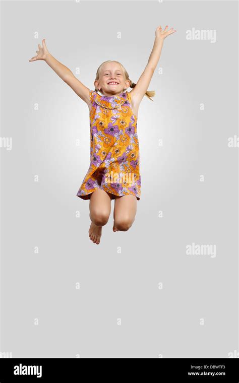 Happy Kid Jumping Stock Photo Alamy
