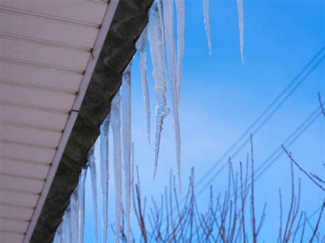 750 Large Icicle Hanging From Roof Stock Photos Pictures And Royalty