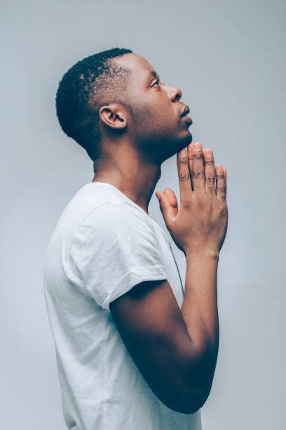11200 Black Man Praying Stock Photos Pictures And Royalty Free Images