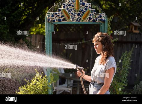 Using Hose Hi Res Stock Photography And Images Alamy