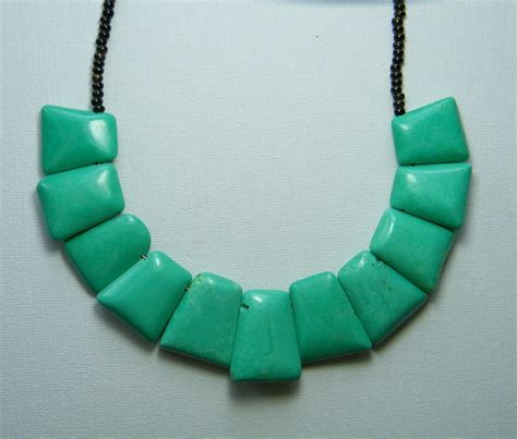 These items fall under a wide range of categories, including jewelry, bags, clothing. throwing paint on it: Egyptian-Inspired Jewelry on Etsy