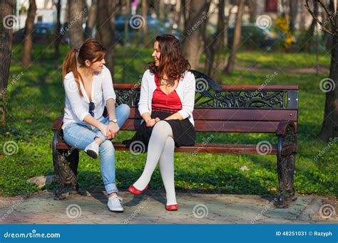 best friends talking in the park stock image image of relaxed sunny 48251031