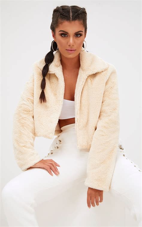 cream cropped faux fur coat coats and jackets prettylittlething uae