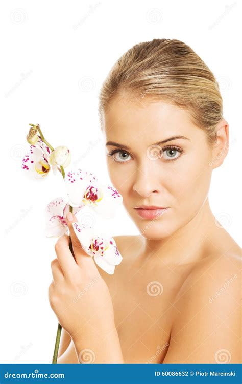 Sensual Portrait Of Nude Woman With Orchid Flower Stock Photo Image