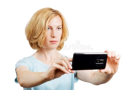 Portrait Of Young Woman Taking Photo With Mobile Phone Stock Image
