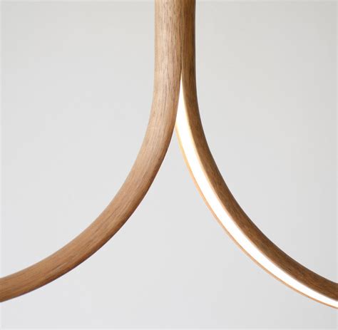 These Minimal Handcrafted Wooden Lighting Designs Feature A Split In