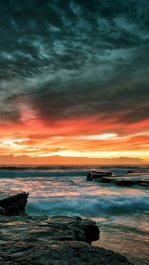 Dramatic Sunset On De Rocky Beach Shore Scenery Nature Ocean