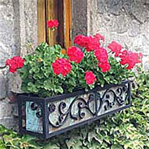 Custom made wrought iron flower box. Huge Gallery of Window Boxes to Share on Pinterest