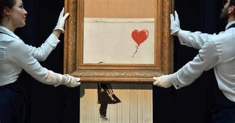 But the shredder built into the frame suddenly stopped halfway through. Banksy shredded painting was moment of creative genius
