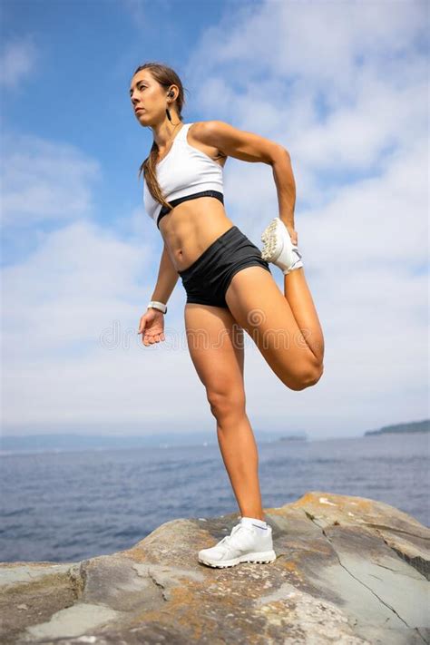 Athletic Woman Stretching Leg During Outdoor Workout Stock Image Image Of Nature Interval