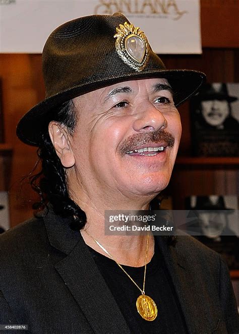 Recording Artist Carlos Santana Arrives At A Book Signing For His New