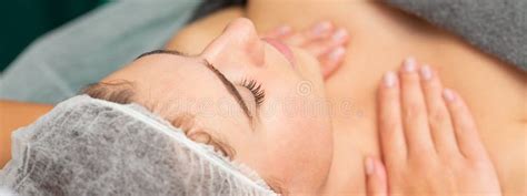 Massaging Female Chest Young Beautiful Caucasian Woman With Closed Eyes Getting Chest Massage