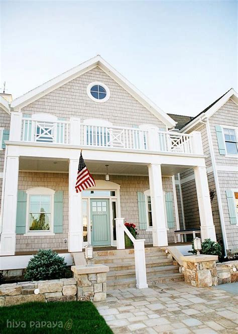Here are our favorite front door colors for making your main entrance more inviting. teal doors & shutters with white trim and cedar shake siding ....LOVE #Beachcottages | Exterior ...