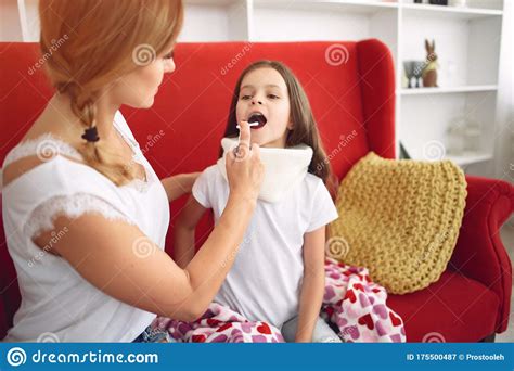 Mother Gives Her Sick Daughter Throat Medicine Stock Image Image Of Nose Caucasian 175500487