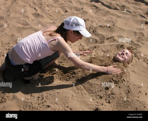 Head Buried Hi Res Stock Photography And Images Alamy