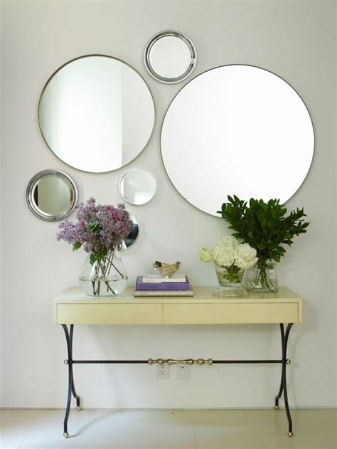 Playing around with size is a great way to liven up your walls, and really adds an extra dimension to your search for any tables, nightstands, benches, or other flat, sturdy pieces of furniture near your mirror. Wall Mirror Decorating Ideas | Houzz