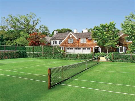 The net is stretched full width and divides the court into two equal parts. The home's grass tennis court. | Dream Home | Pinterest ...